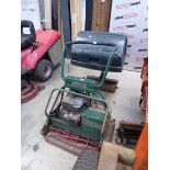 Atco Royal B240 petrol powered green keepers style ride on mower with seat and rear roller and grass