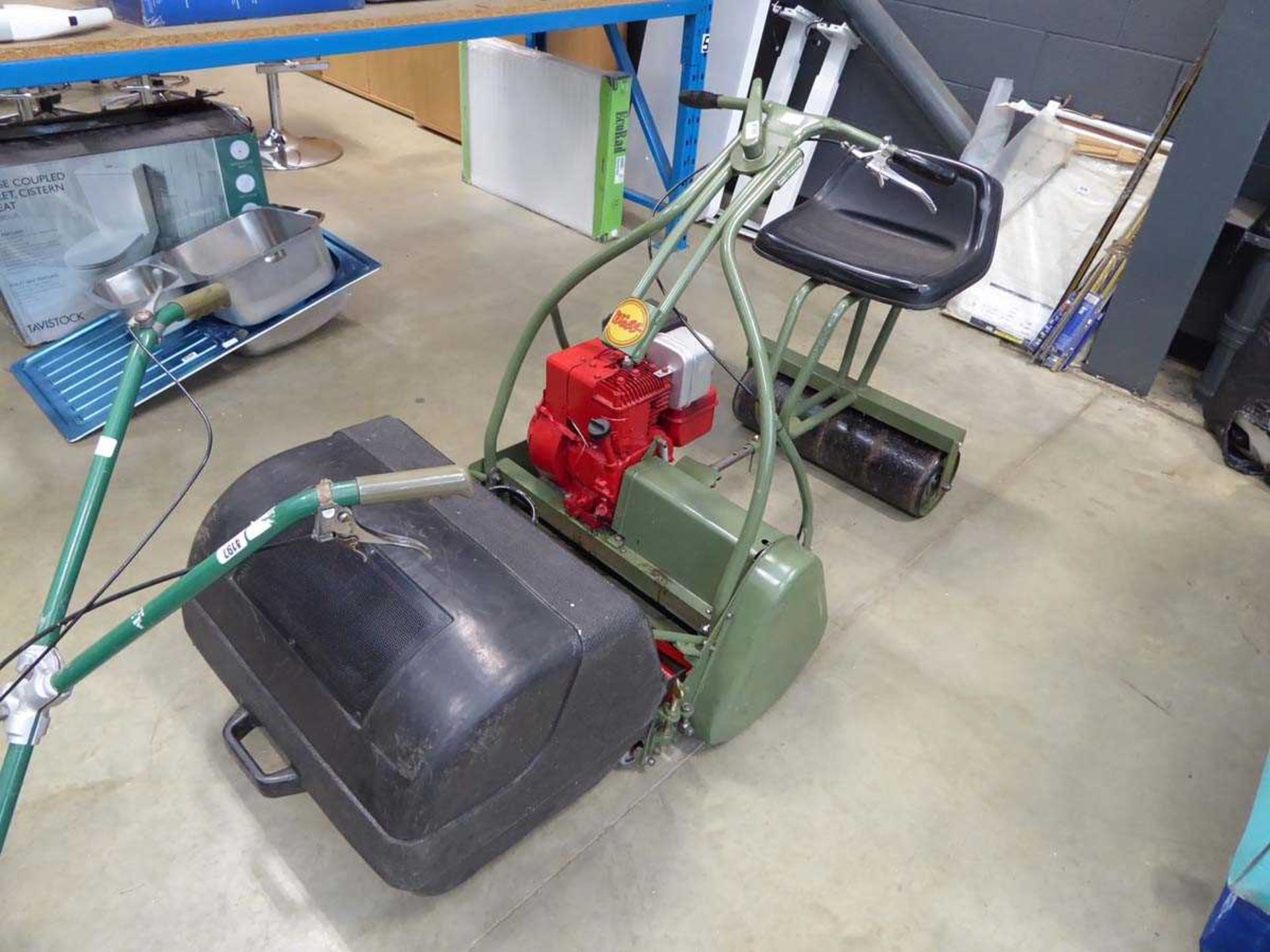 Webb petrol powered cylinder mower complete with front grass box, rear roller and seat