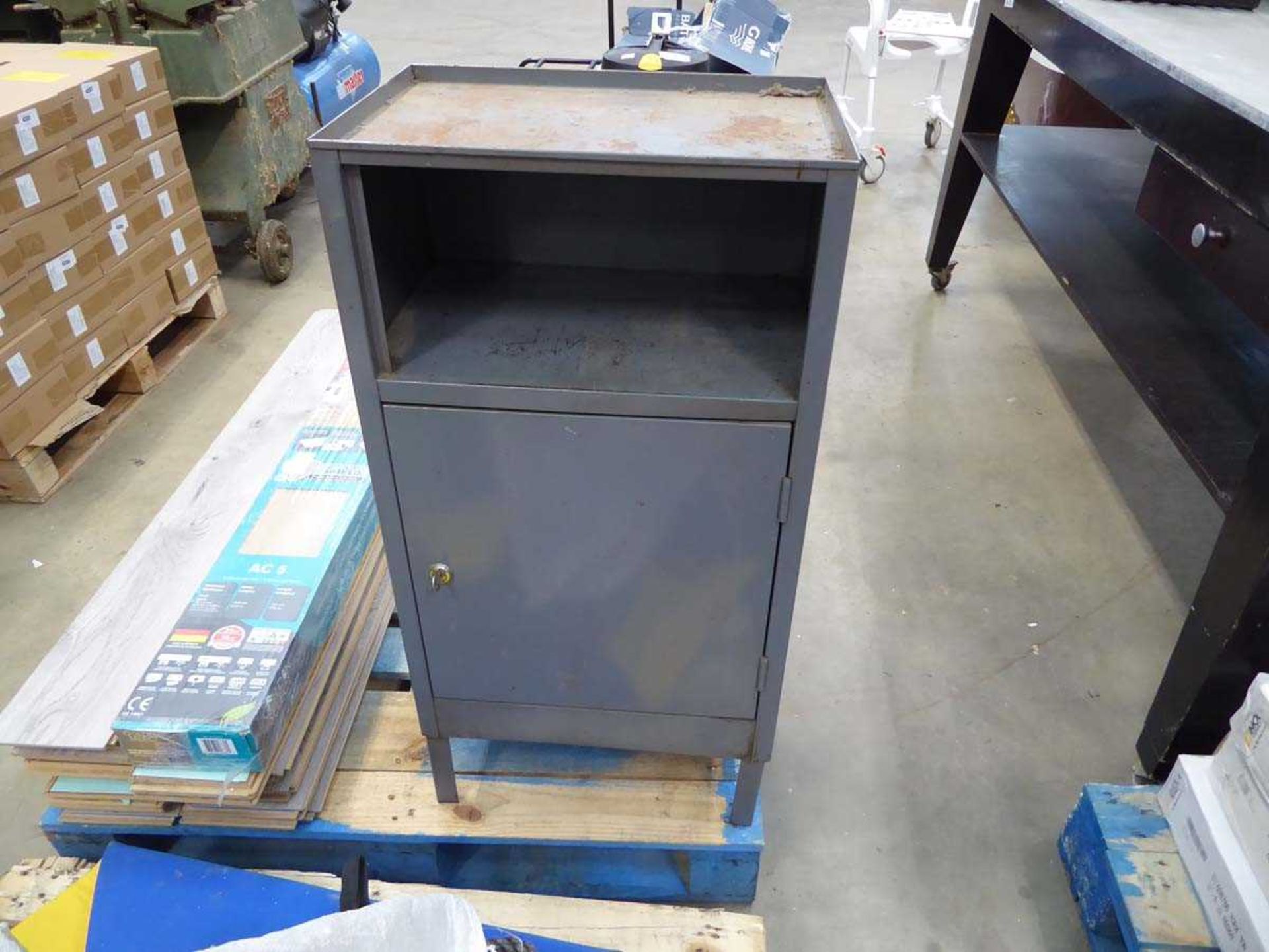 Small grey single door work shop cabinet