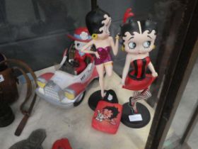 Three Betty Boop figures