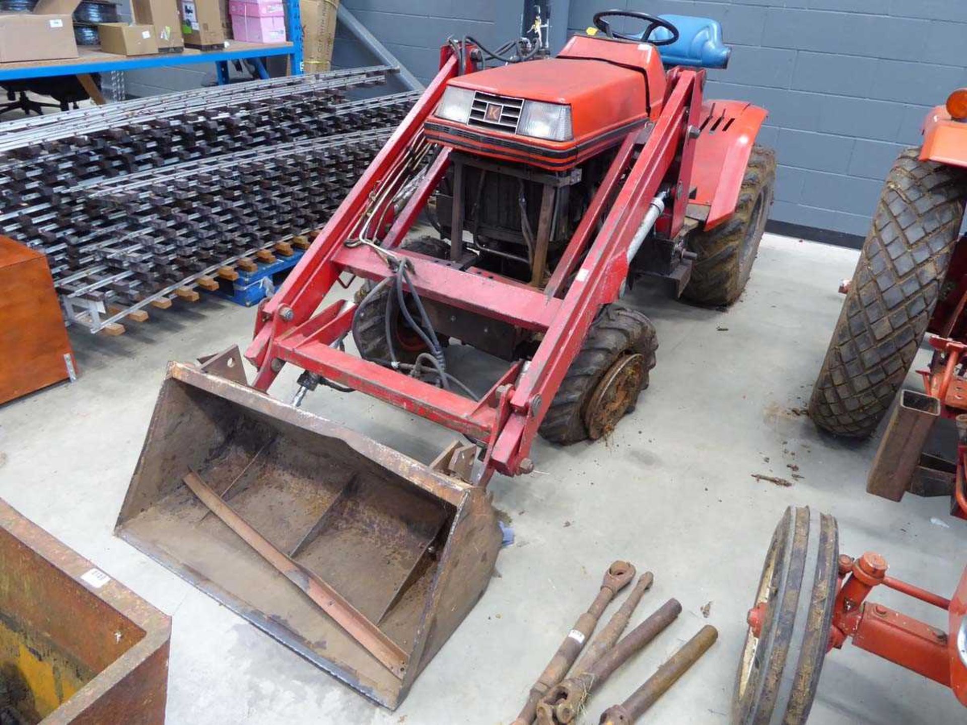 Kubota four wheel drive compact tractor with fore loader