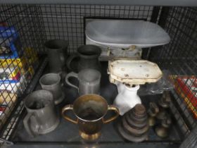 Cage containing pewter flagons, kitchen scales and weights