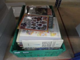 Box containing teddy bear reference books