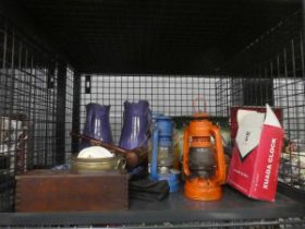 Cage containing oil lamps, vases, other crockery and set of dominoes