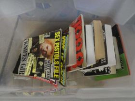 Box containing music magazines and reference books