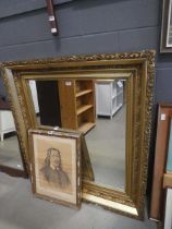 Mirror in decorative gilt frame