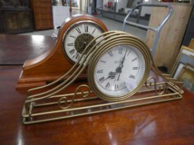 2 dome topped quartz mantle clocks