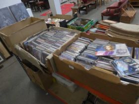 Three boxes containing a quantity of CDs