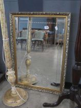 Rectangular bevelled mirror in gold floral frame