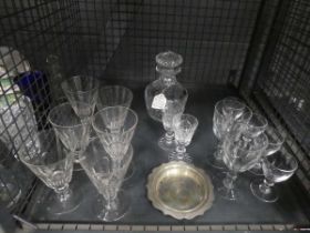 Cage containing crystal decanter, plus wine glasses