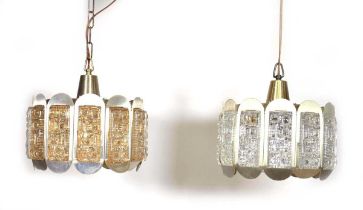 A pair of 1970's Danish brass-work ceiling lights mounted with glass panels and inner glass shades