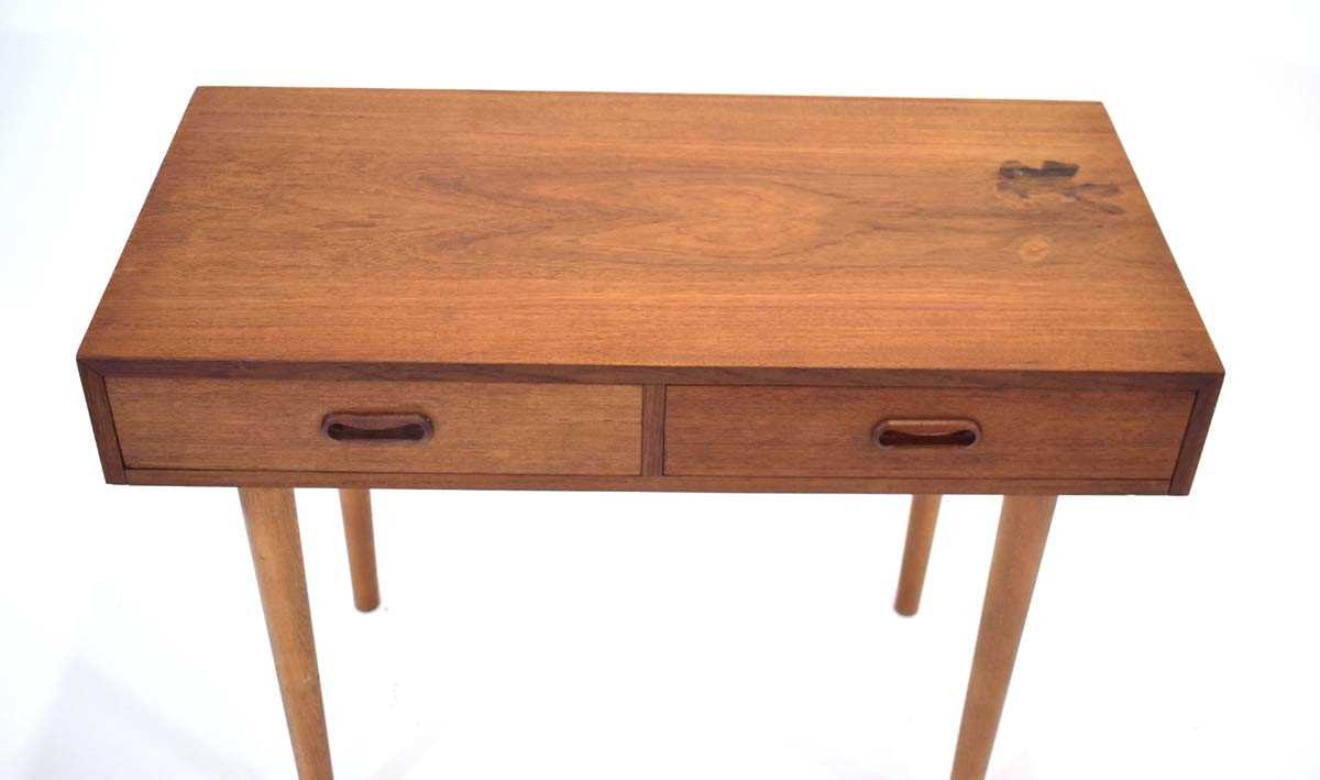 A 1960's teak single drawer side/console table with two drawers and curved handles, on later slender - Image 2 of 2