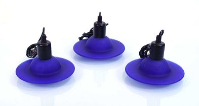 A set of three late 20th century moulded blue glass pendant lights (3) Diameter 17 cm each. No chips