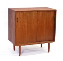 A 1970's Swedish teak cabinet with two sliding doors, on later legs, w. 80 cm Structurally sound,