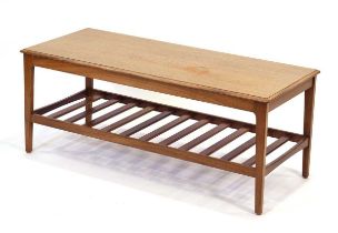 A 1970's Remploy Furniture teak coffee table with a second slatted tier, 106 x 44 cm