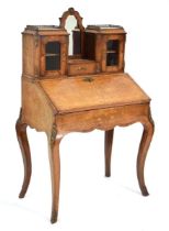 A late 19th century French walnut, marquetry and brass mounted bonheur de jour or writing table, the