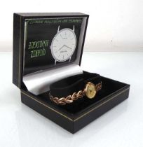 A ladies 9ct yellow gold wristwatch by Accurist, the circular dial with Roman and baton numerals