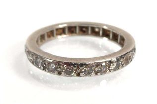 An early 20th century white gold full eternity ring set brilliant cut diamonds, ring size O, 4.7