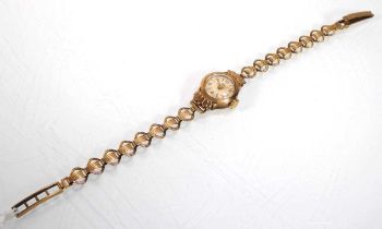 A ladies 9ct yellow gold wristwatch by Avia, the circular dial with gold coloured baton and Arabic