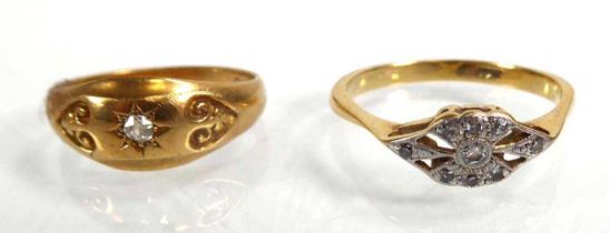 An Edwardian 18ct yellow gold ring set small diamond in a recessed star setting, Birmingham 1906,
