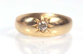 An 18ct yellow gold signet ring set old cut diamond in a recessed star setting, ring size M, 3.4