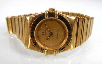 A ladies 18ct yellow gold Constellation wristwatch by Omega, the circular dial with dot markers
