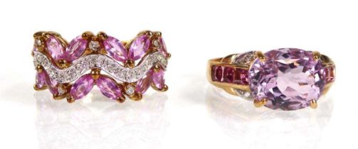 A 9ct yellow gold ring set pale pink stones and diamonds in a wavy setting and a similar 9ct ring,