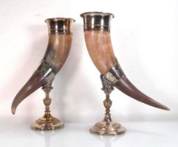 A pair of horn drinking vessels, each of typical form with silver plated mounts, WMF, h. 28.5 cm (2)