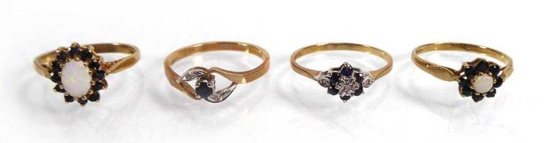 Four 9ct yellow gold cluster rings set various stones, various sizes, overall 7.2 gms (4)