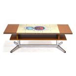 A 1970's teak and tile-topped coffee table, the rectangular surface over a second tier, 123 x 46 cm