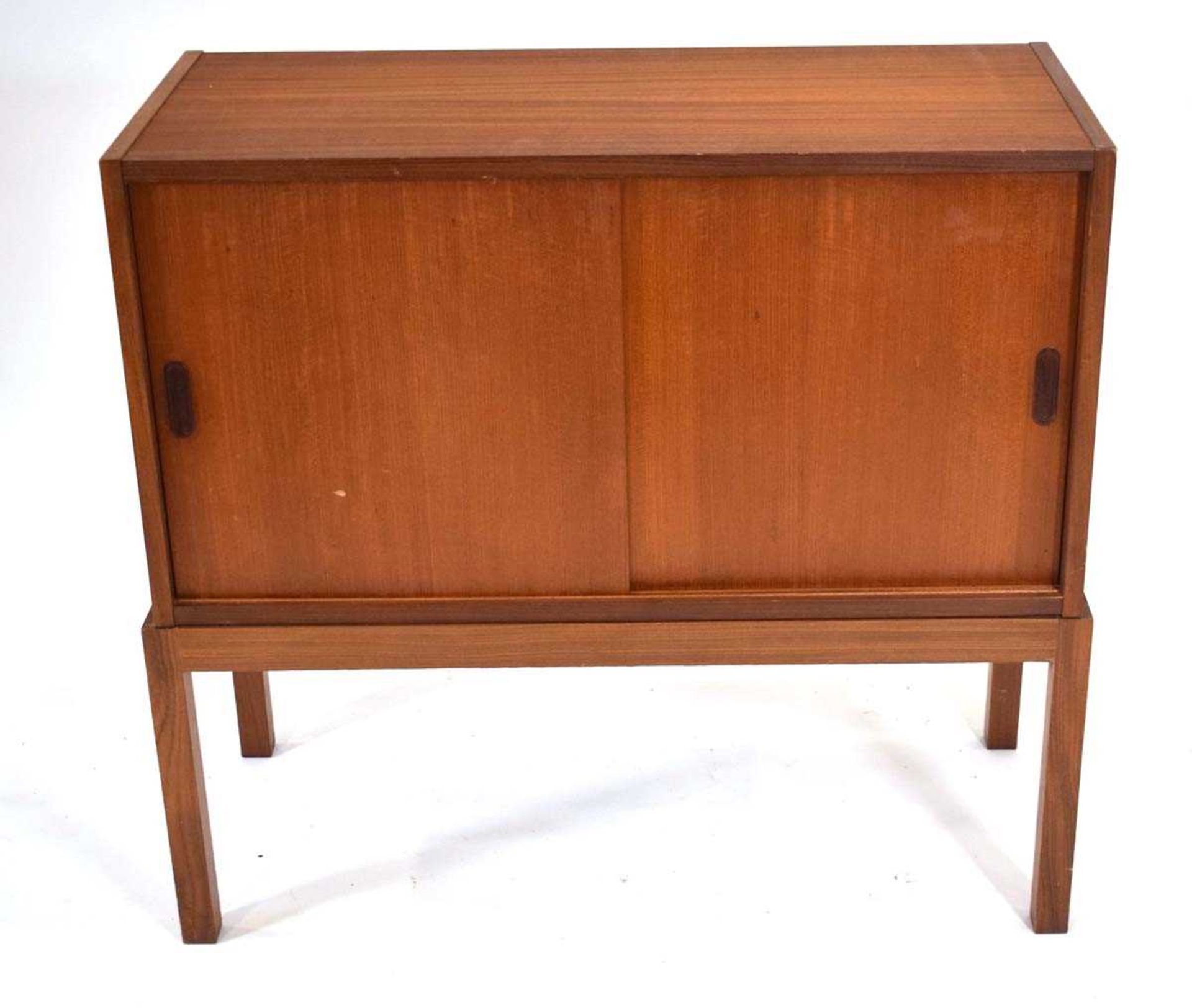 A 1970's teak cabinet with two sliding doors on square legs, 89 x 40 x 43 cm - Image 2 of 3