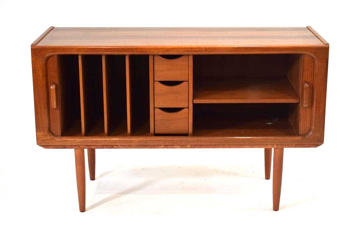 A 1970's Danish teak tambour music cabinet by Vantinge Mobelindustri, on later turned legs,