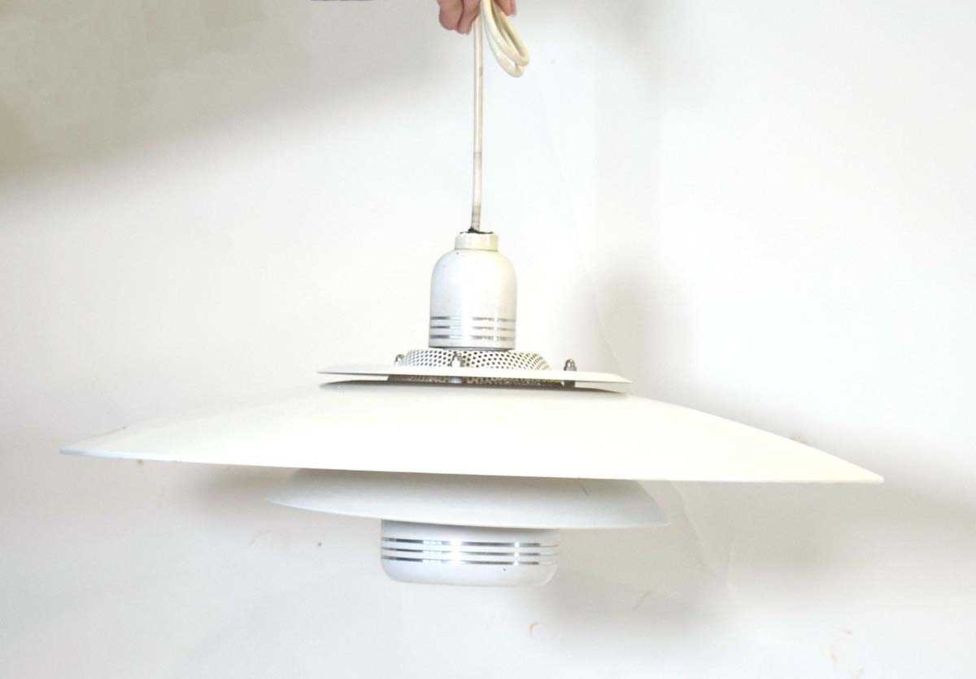 A Danish white enamelled four-tier open ceiling light in the manner of Louis Poulsen