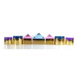 A group of seven Jonathan Adler brass finished trinket/storage boxes with coloured perspex lids (