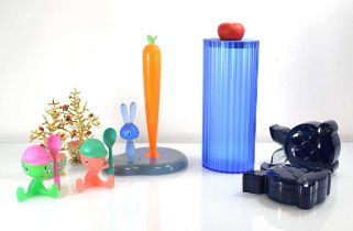 A group of Alessi plastics including a 'Bunny and Rabbit' roll holder, a spaghetti holder, a pair of