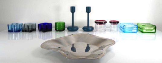 A group of Finnish decorative objects by Iittala including a stainless steel tray, a pair of moulded