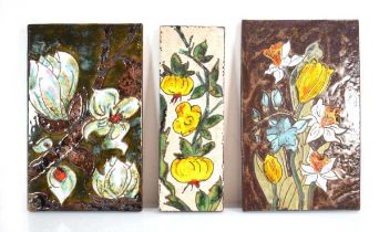 A pair of German pottery wall plaques by Ruscha decorated with floral sprays, 37 x 22 cm, together