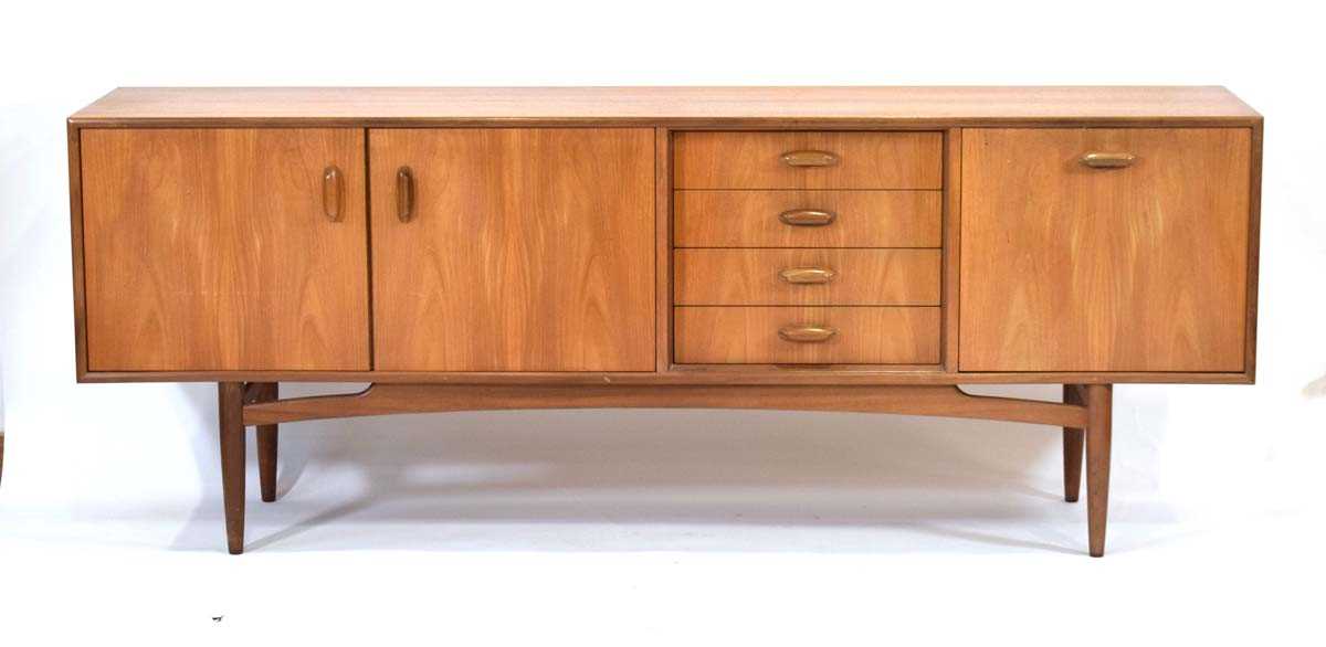 A 1960's G-Plan teak sideboard with a pair of doors, four drawers and a fall-front door, on tapering - Image 2 of 25