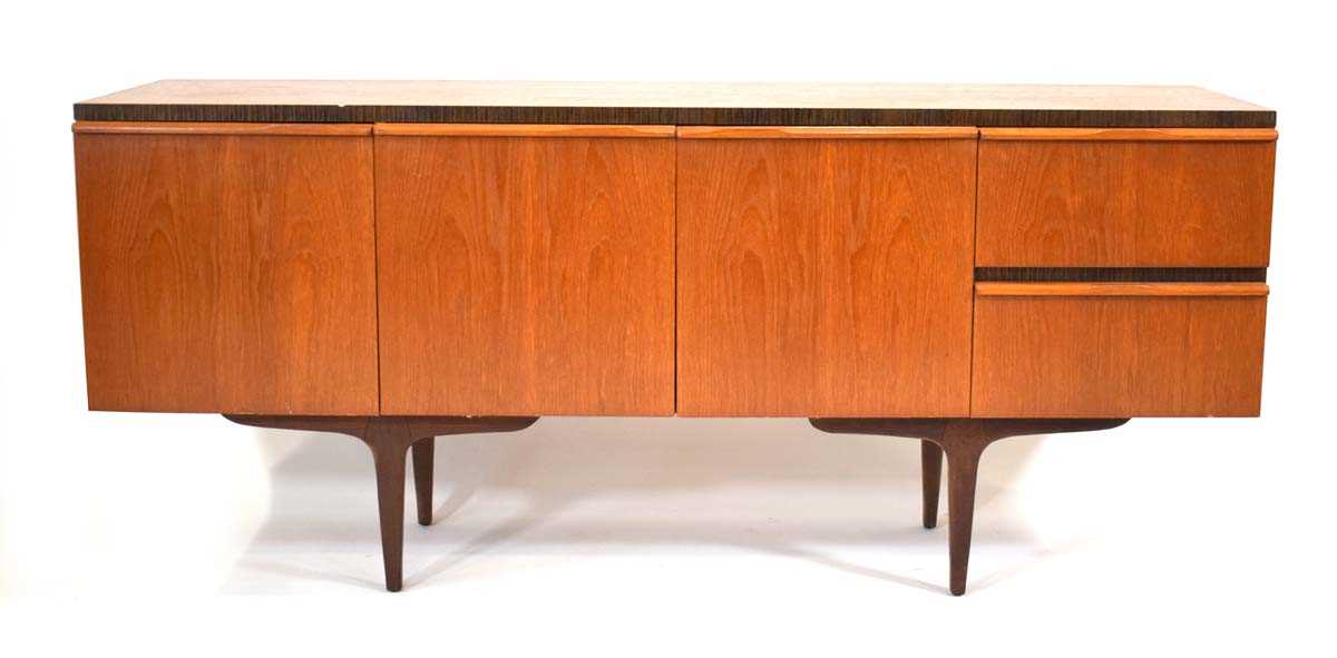 A 1960/70's teak sideboard with two drawers and three drawers, on associated legs, w. 180 cm, h.