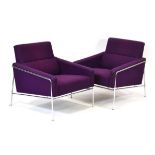Arne Jacobsen for Fritz Hansen, a pair of 2010's Danish 'Series 3300' armchairs upholstered in