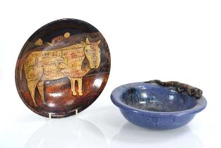 A 1994 Cuban pottery plate by Eduardo Leyva together with a (?)German studio pottery bowl surmounted