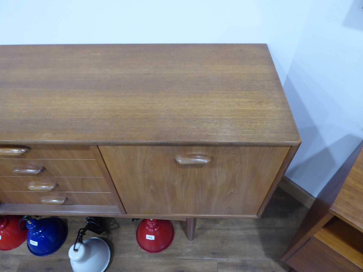 A 1960's G-Plan teak sideboard with a pair of doors, four drawers and a fall-front door, on tapering - Image 14 of 25