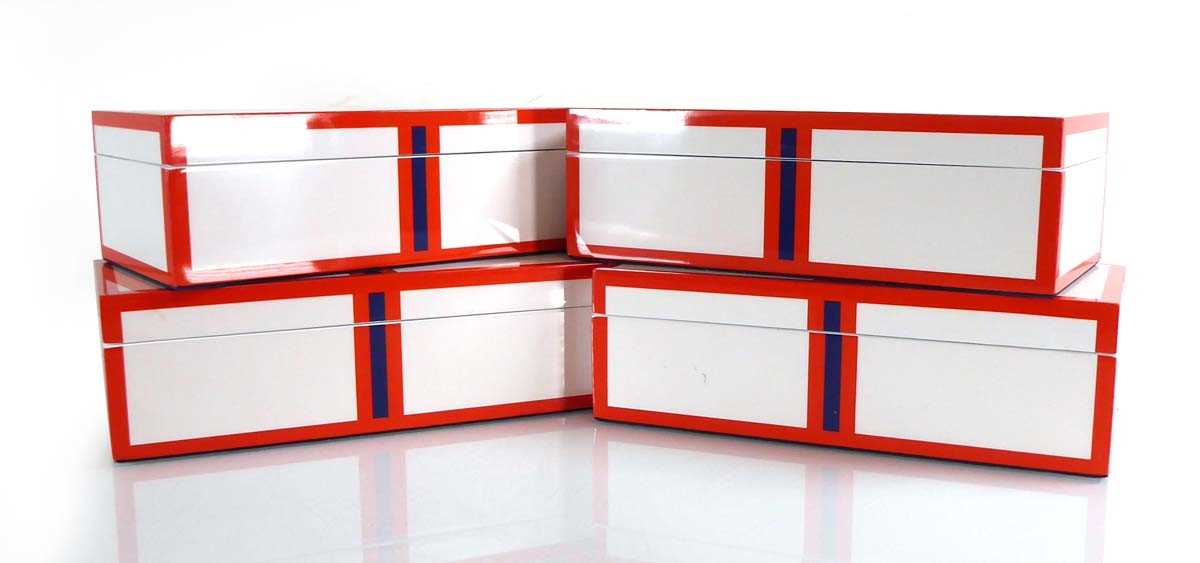 A group of four Jonathan Adler geometric boxes, 20 x 10 x 7 cm (4)