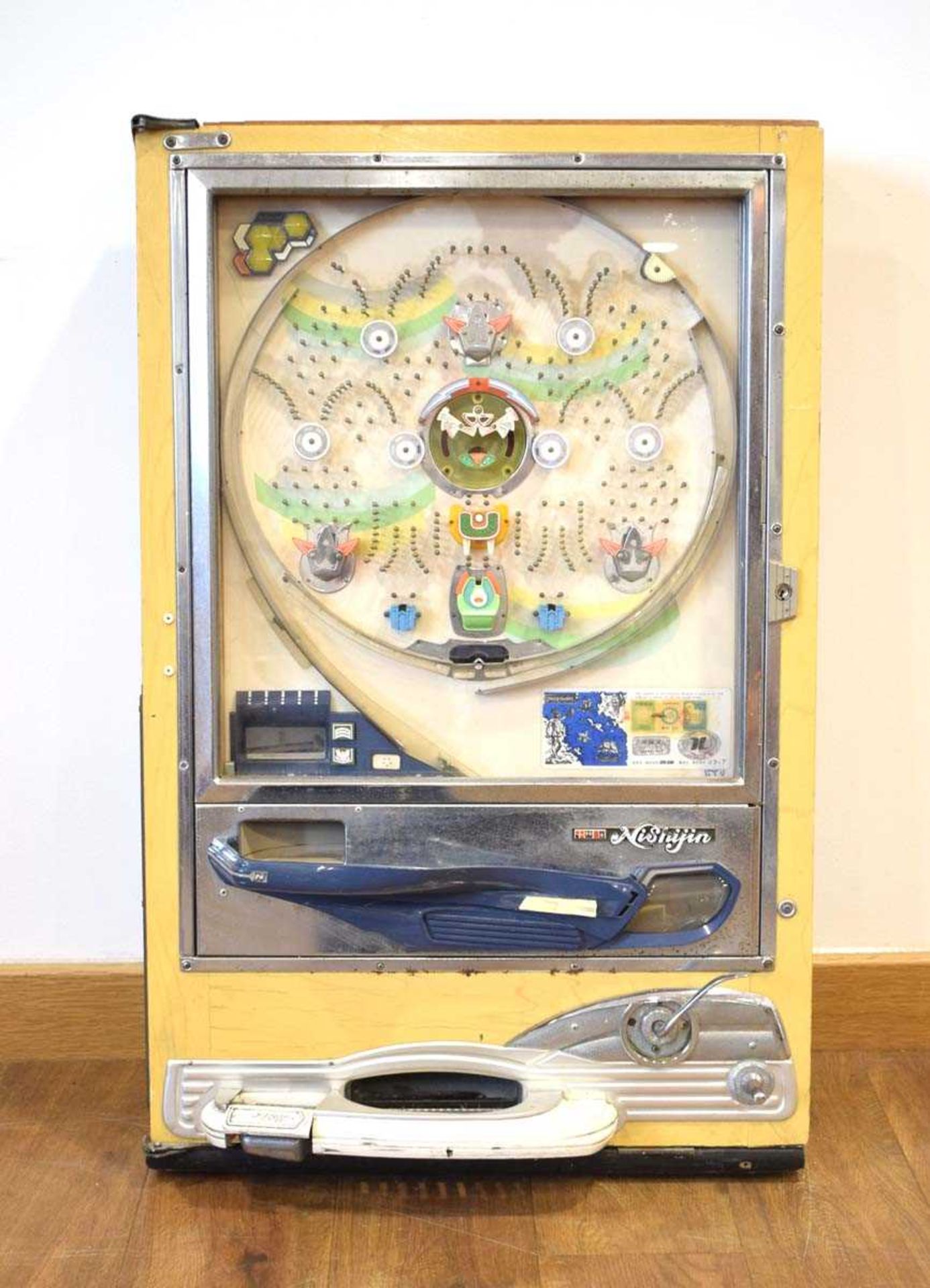 A Japanese Pachinko pin-ball games machine, 83 x 52 cm The working order is unknown and there is