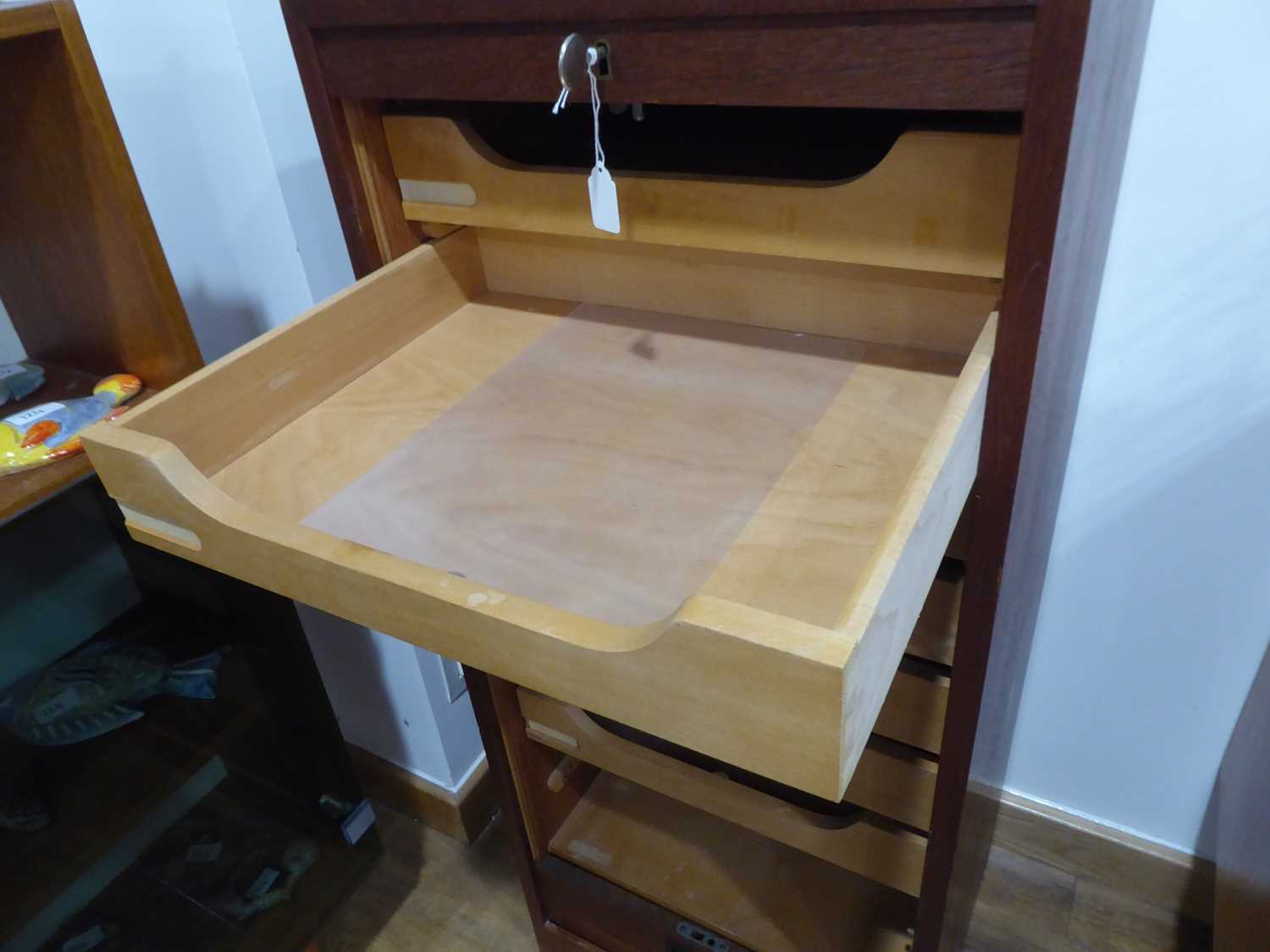 A 1950's Danish teak tambour cabinet fitted with seven beech drawers on a plinth base, 45 x 35 x 108 - Image 4 of 10