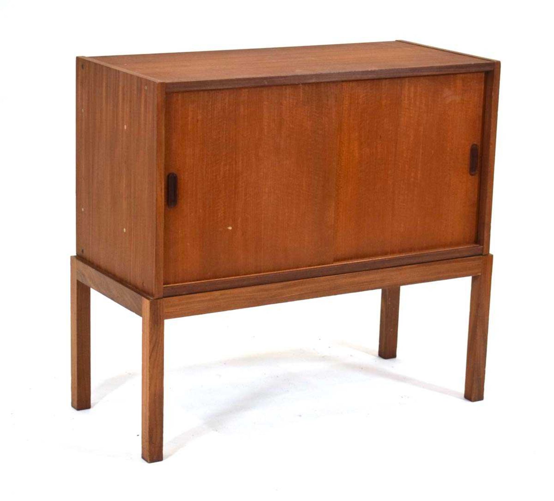 A 1970's teak cabinet with two sliding doors on square legs, 89 x 40 x 43 cm