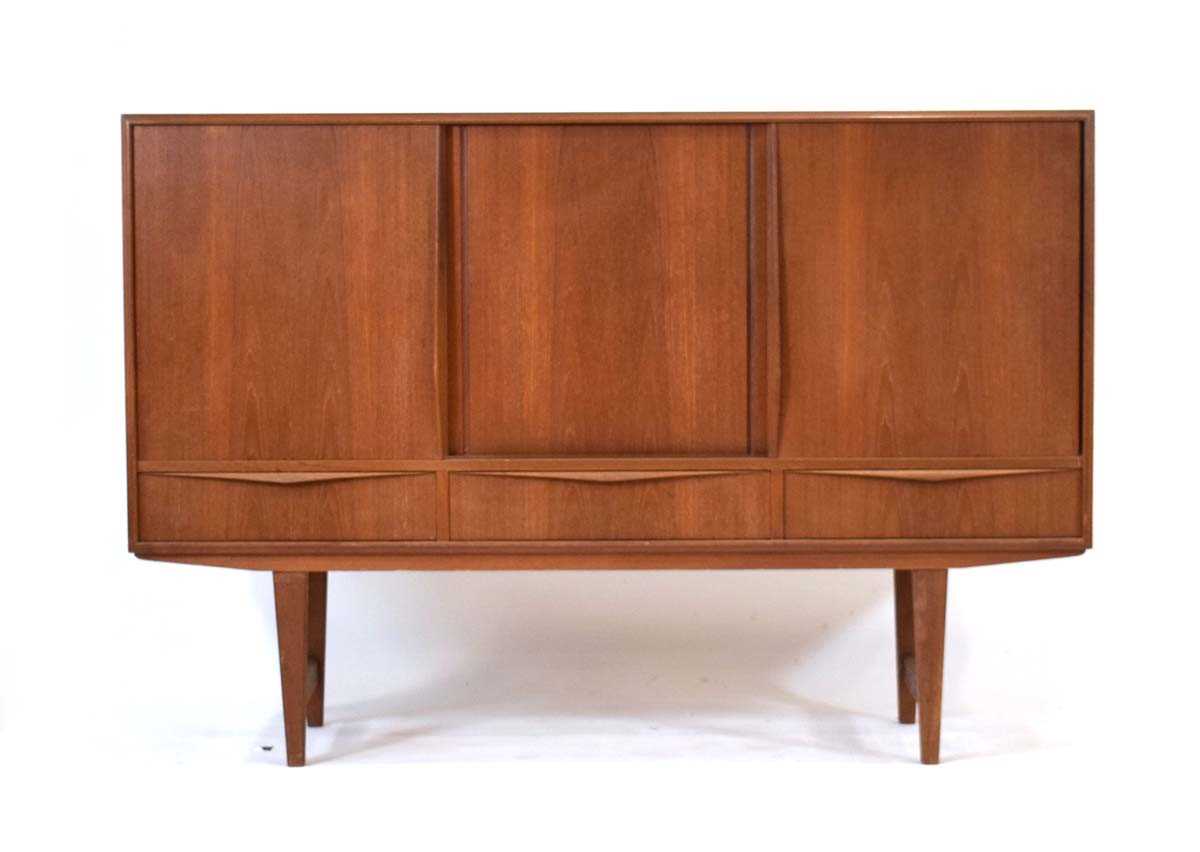 E W Bach for Sejling Skabe, a 1960's Danish teak sideboard with three sliding doors enclosing - Image 2 of 4