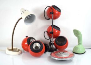 A Pifco white gooseneck desk lamp together with a Metamec clock, a group of 'eyeball' lamps and a