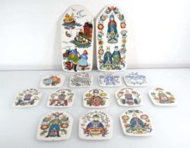 A group of Norwegian wall plaques by Figgjo Flint including two large 32 x 15 cm and twelve smaller,