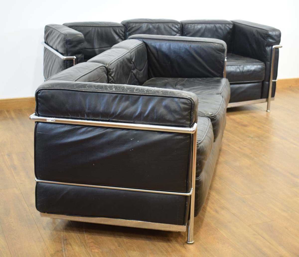 After Le Corbusier, Pierre Jeanneret and Charlotte Perriand, a pair of three seater black 'LC3' - Image 2 of 3